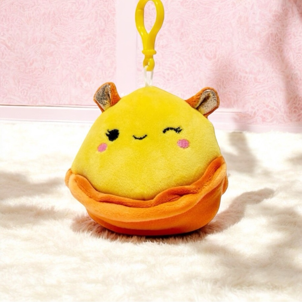 Bijan the Yellow & Orange Dumbo Octopus Squishmallows Clip